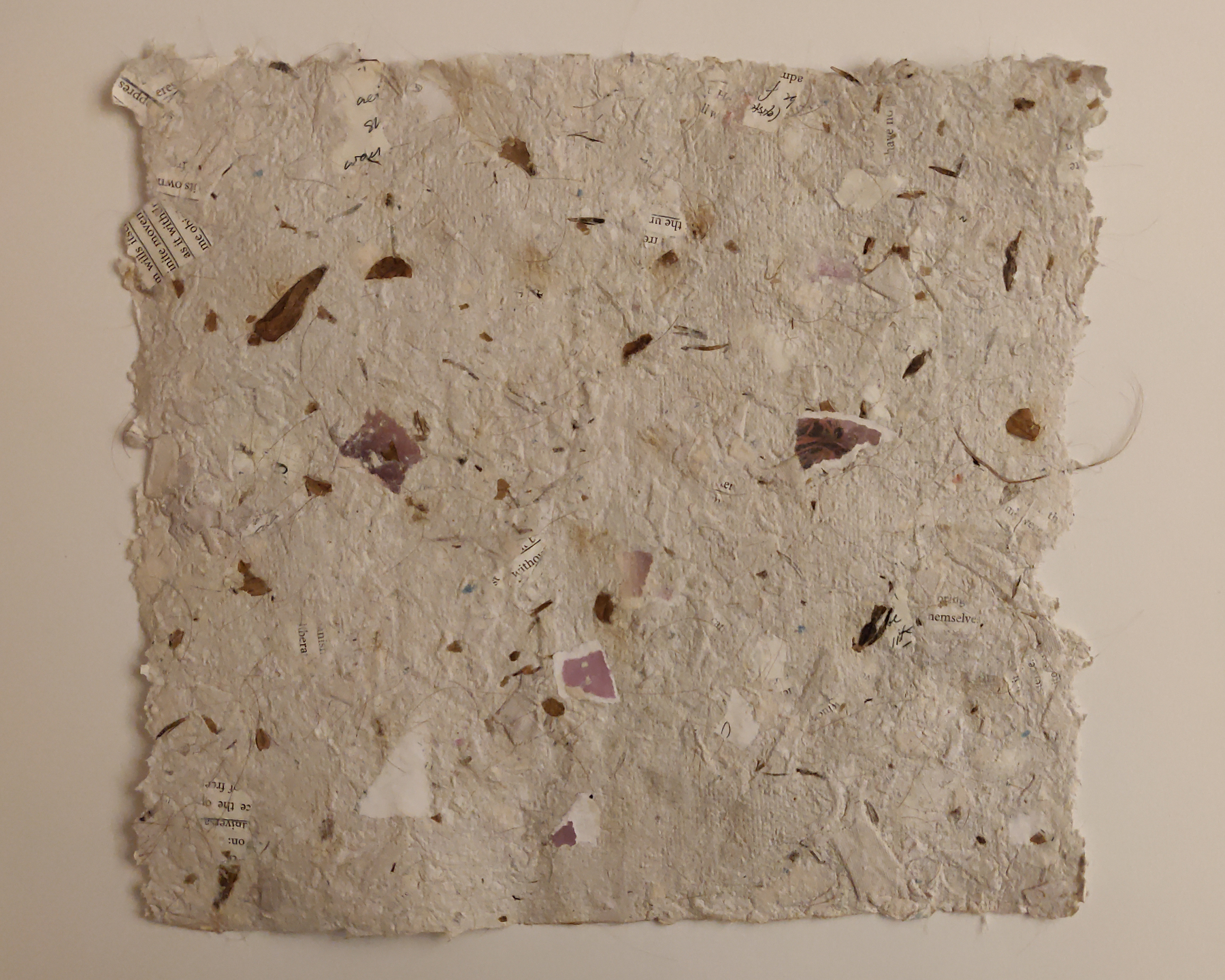handpressed paper, cotton, reused print, dried lily petals, lily extract,  artist's hair (2020)
